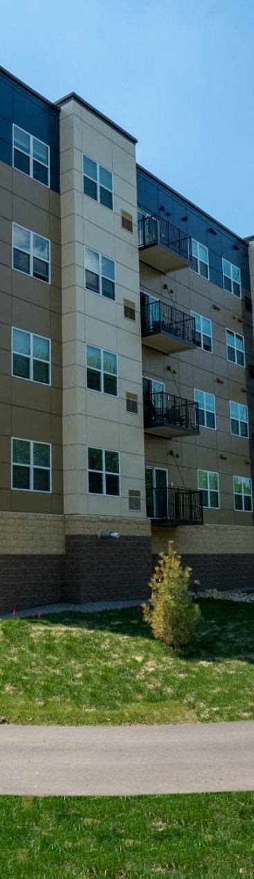 Exteriors New Apartments near Downtown Minneapolis St. Paul MN.-Luxury Studio, 1, 2 and 3 Bedroom Apartments-Berkshire Central- 9436 Ulysses Street NE Blaine, MN. 55434